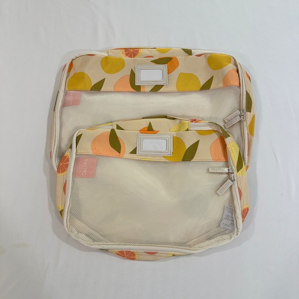 CALPAK Packing Cube Travel Organizer Citrus Fruit Print Lemon Orange Cream - Picture 1 of 11